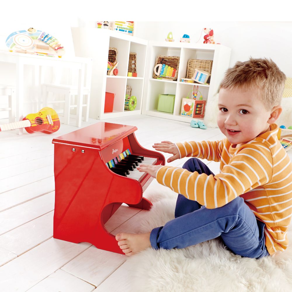 Piano rojo infantil de madera con 18 teclas